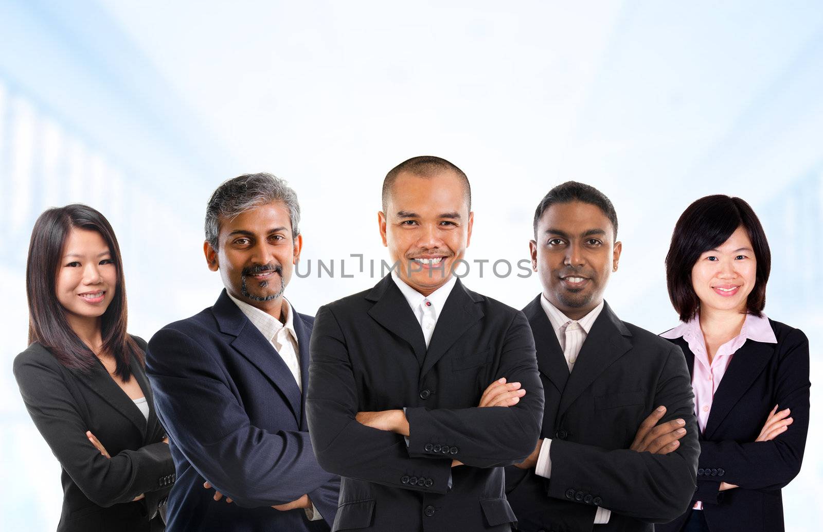 Asian business person in multiracial. Diversity business people form by different races, Indian, Malay, Indonesian, Chinese standing in office environment.