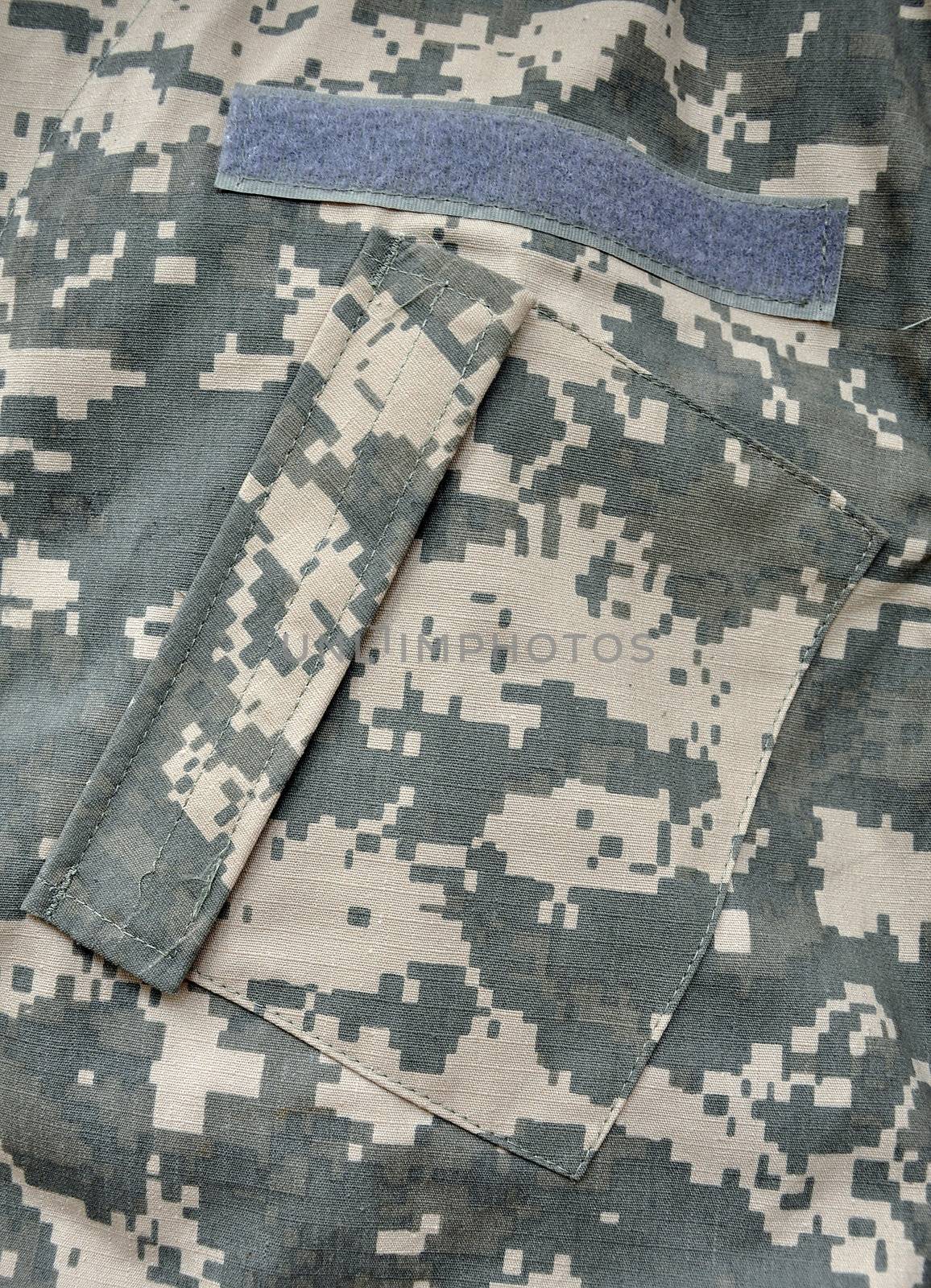 The Universal Camouflage Pattern (UCP), also referred to as ACUPAT (Army Combat Uniform PATtern) or Digital Camouflage ("digicam") is the military camouflage pattern currently in use in the United States Army's Army Combat Uniform.