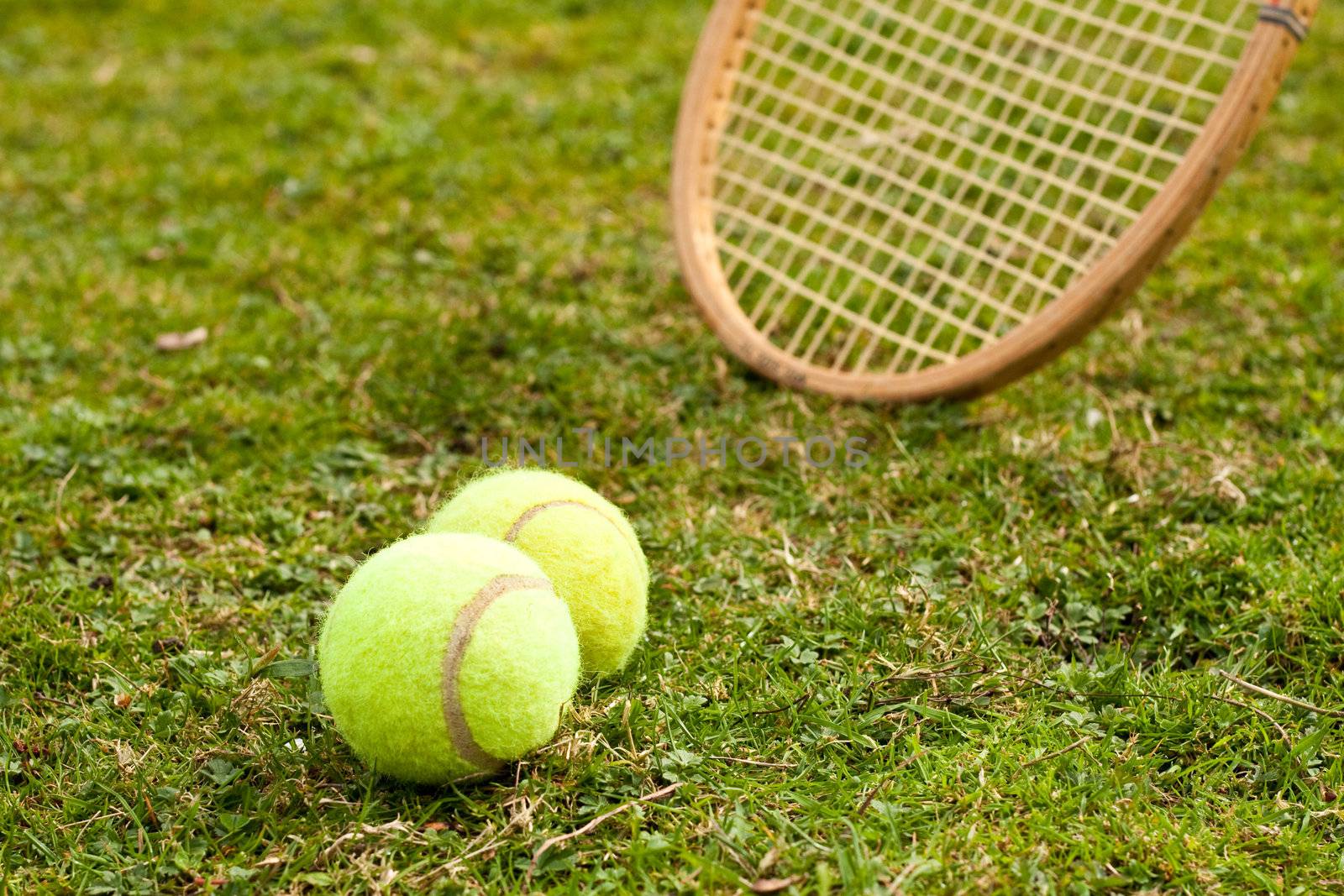 Tennis raquet and balls