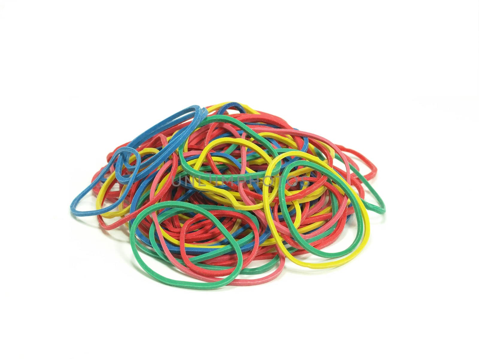 pile of colorful rubber bands on white background