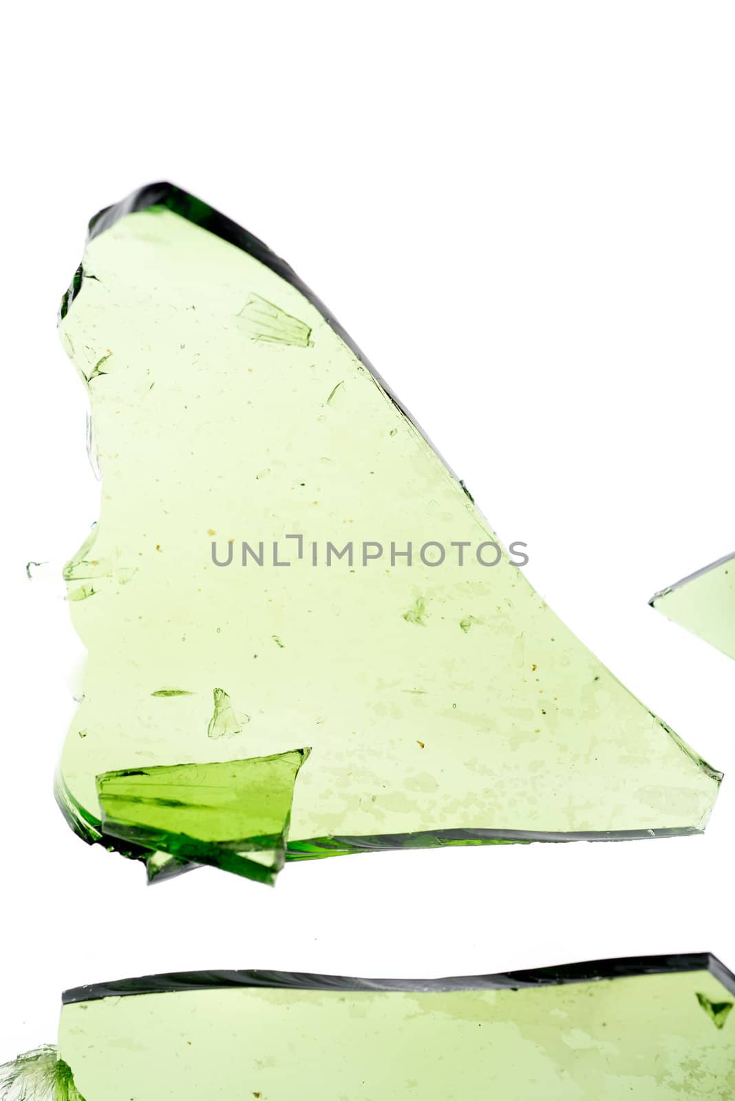 Large green shard of glass isolated on white