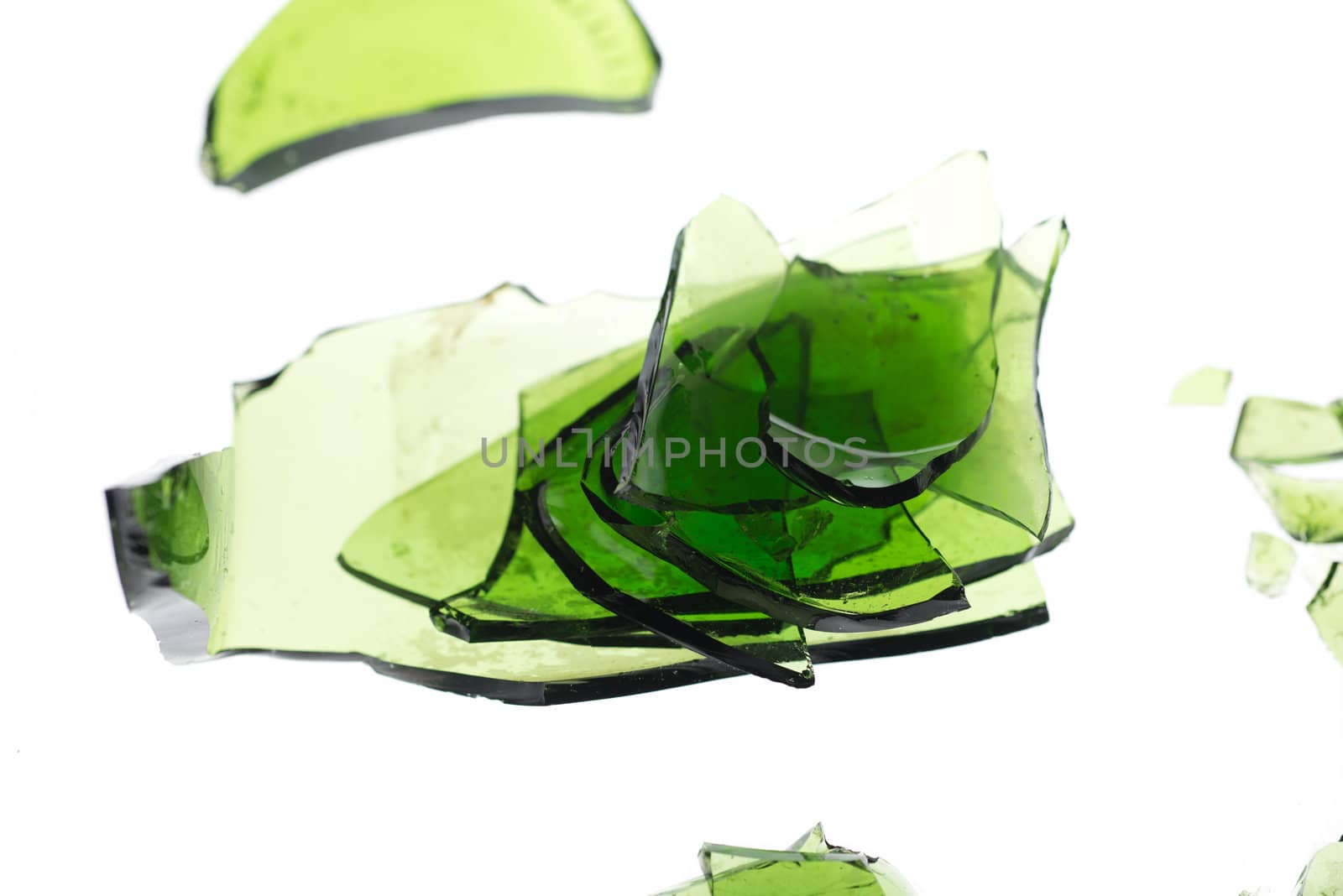 Piled up glass fragments isolated on white