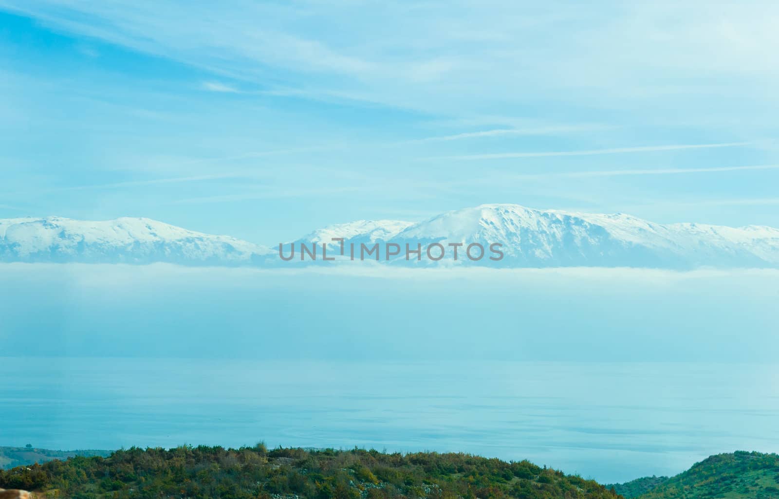 Blue snowy mountains in Macedonia by oguzdkn