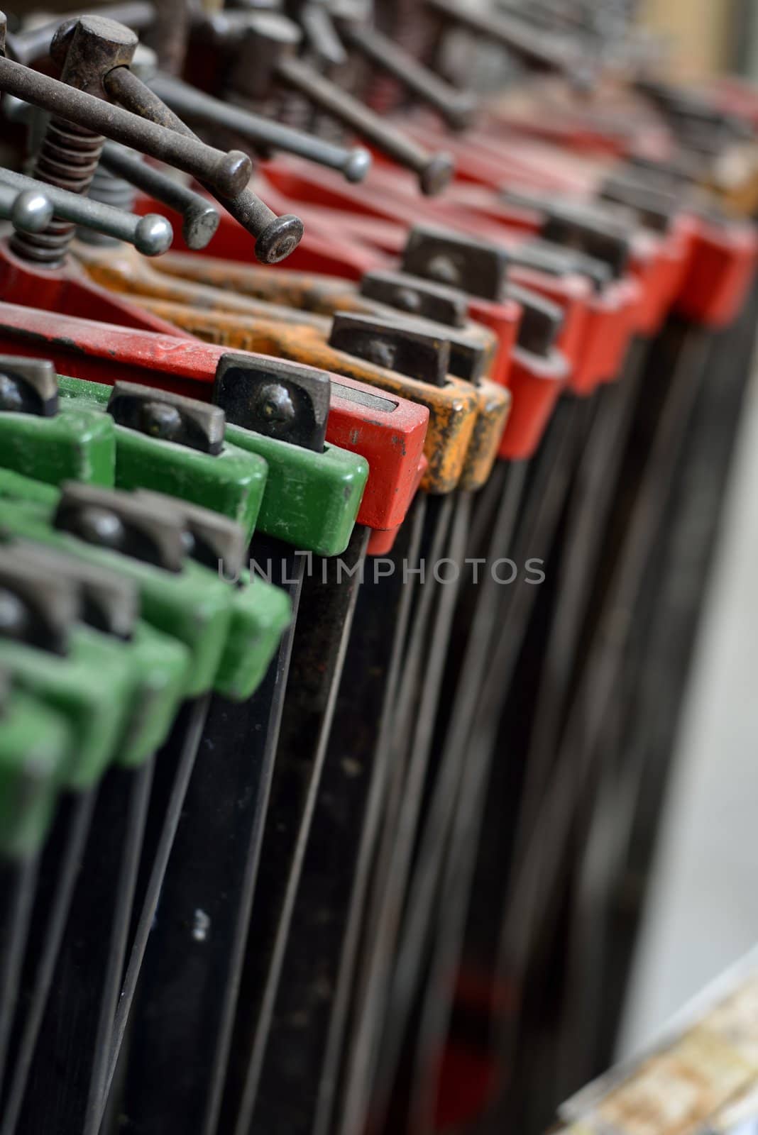 Some colored iron tools in a factory