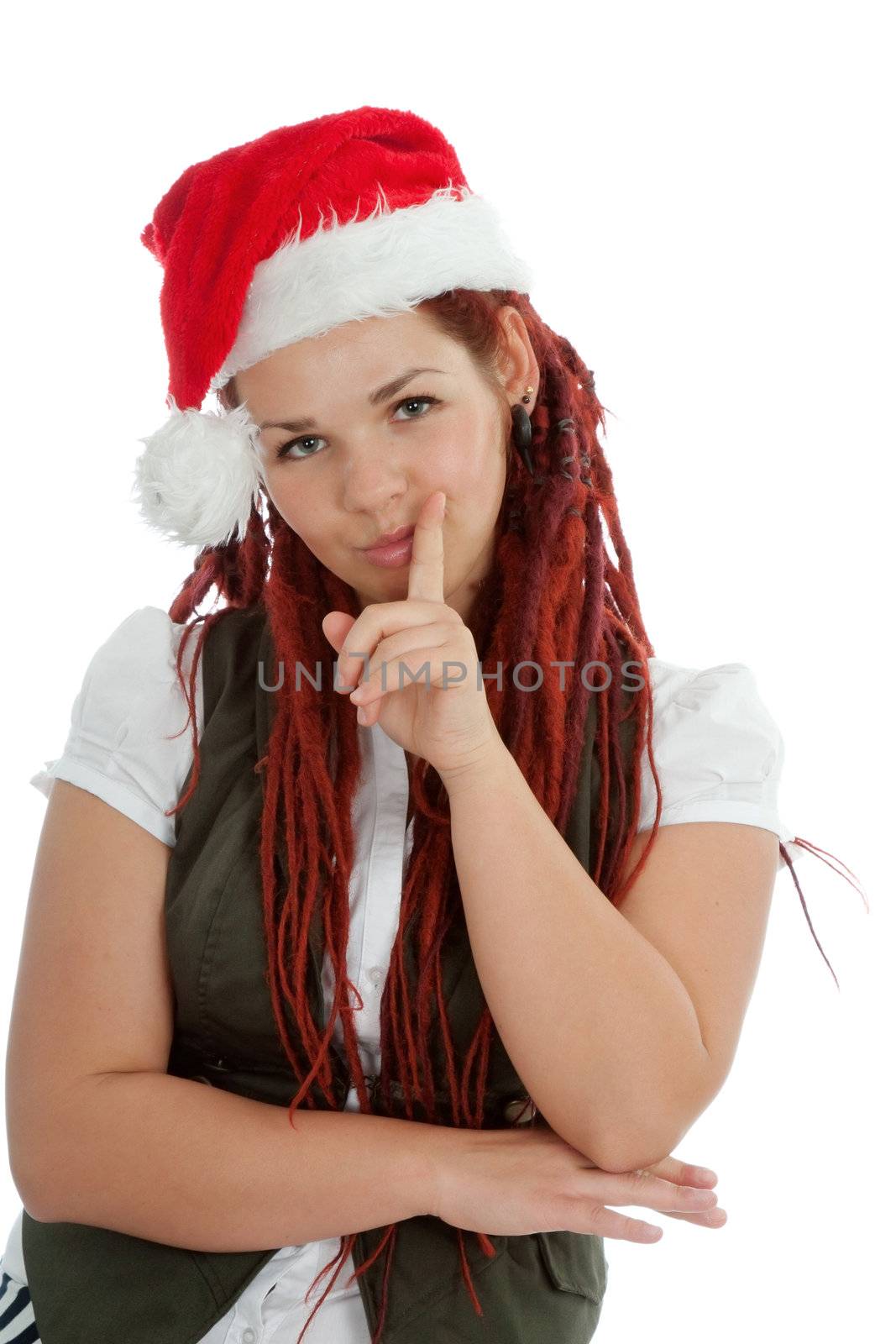 Young modern girl wearing Santa Claus hat isolated on white background.