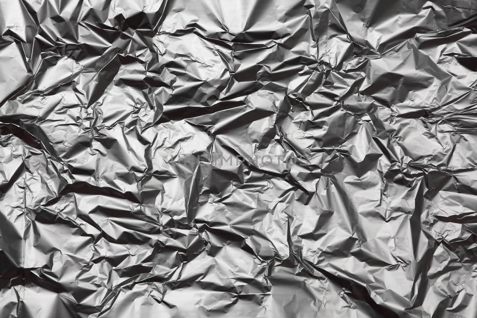 Photo of the dull side of a sheet of cooking aluminum foil wrap.