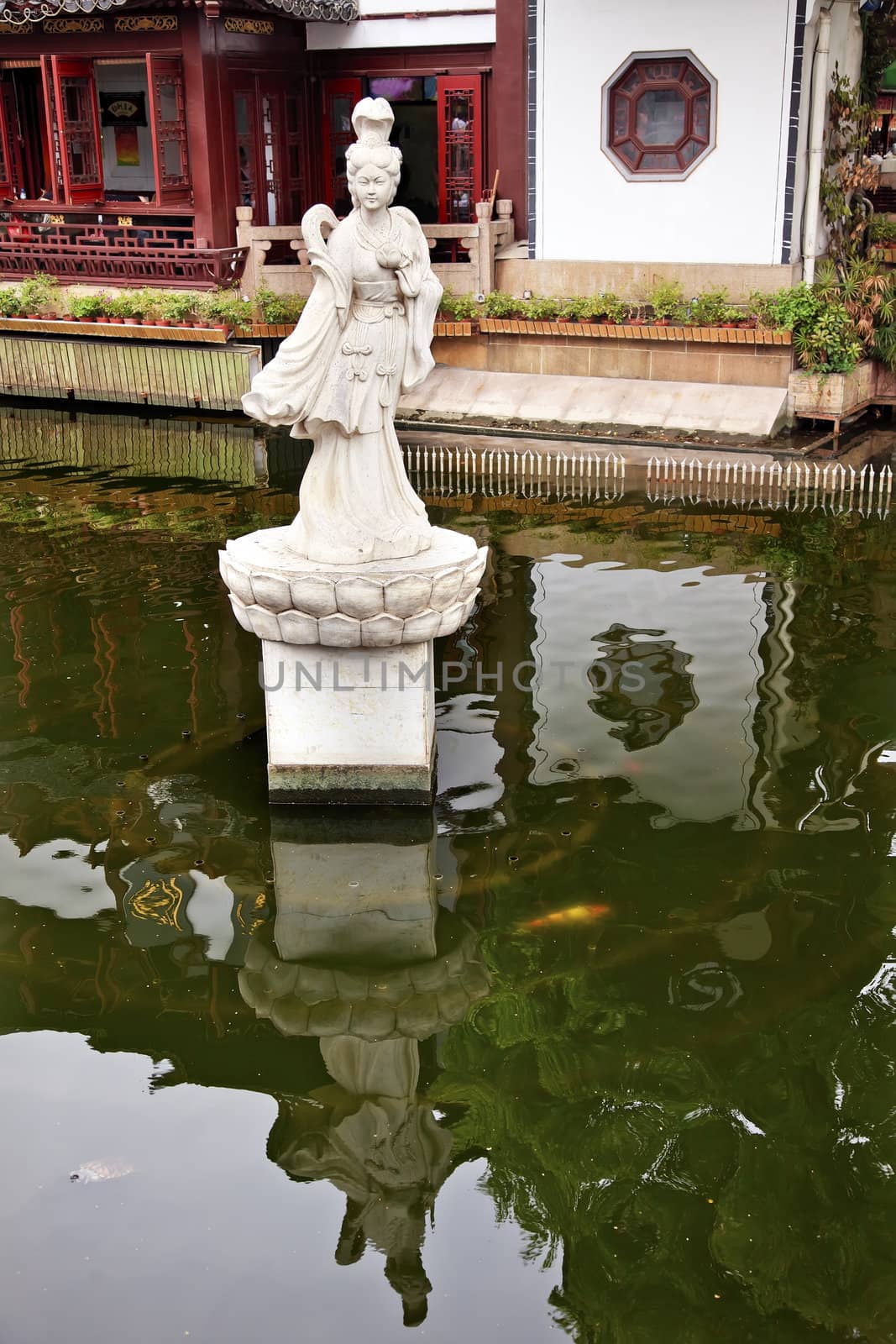 Woman Statue Shanghai Yuyuan Garden with Reflections China by bill_perry