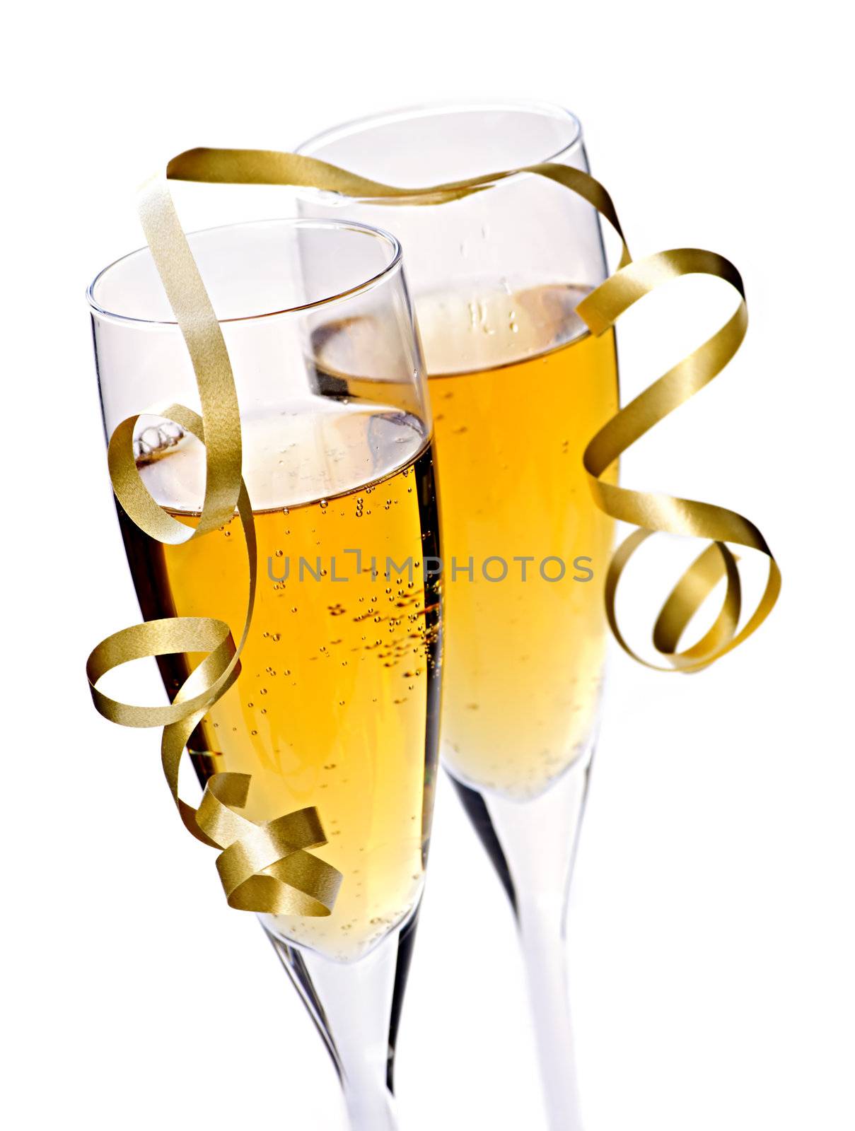 Two full champagne flutes with sparkling wine and ribbon isolated