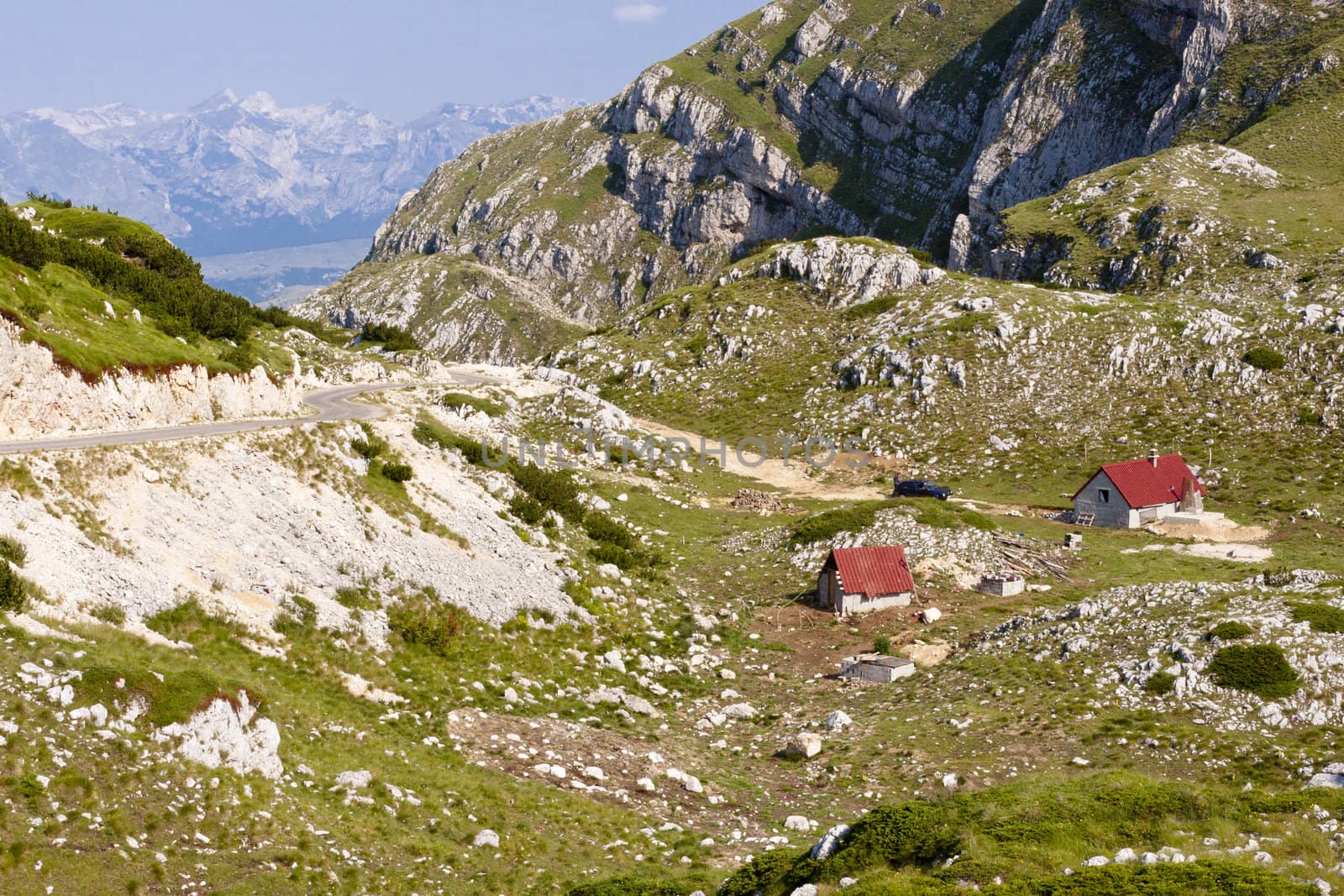 Two cottage with red roofs in Durmitor national park - Montenegro.