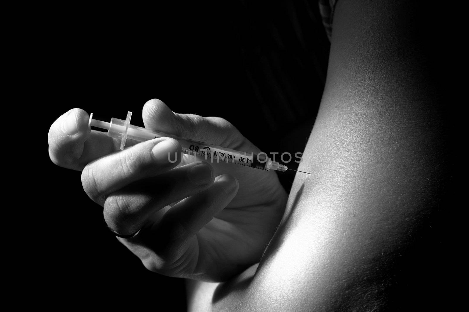 Black and white foto of insulin injection pen