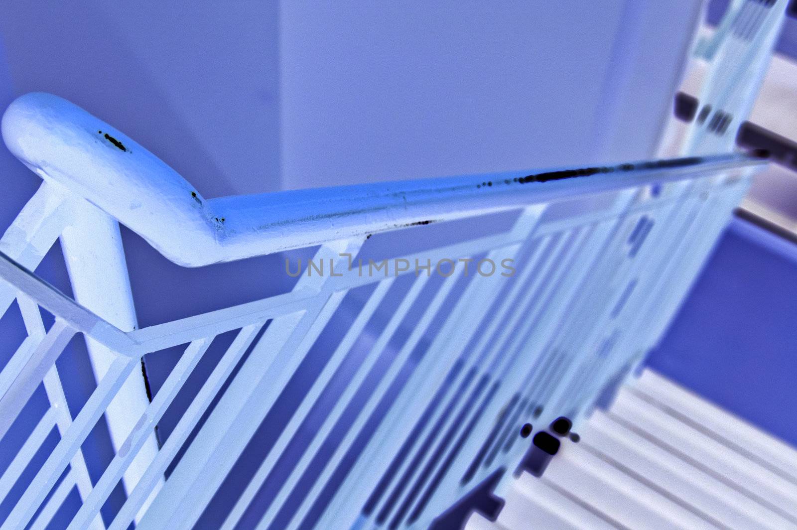 Shaded foto of ladder to the next floor