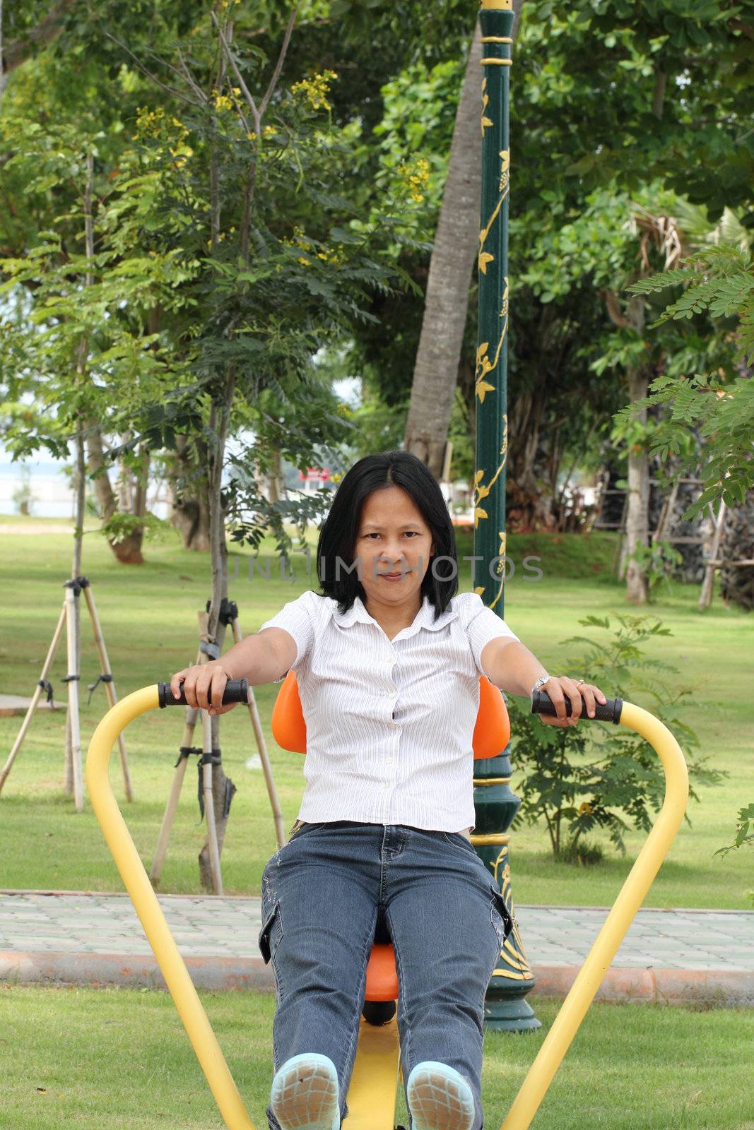 Woman exercising outdoor in a park