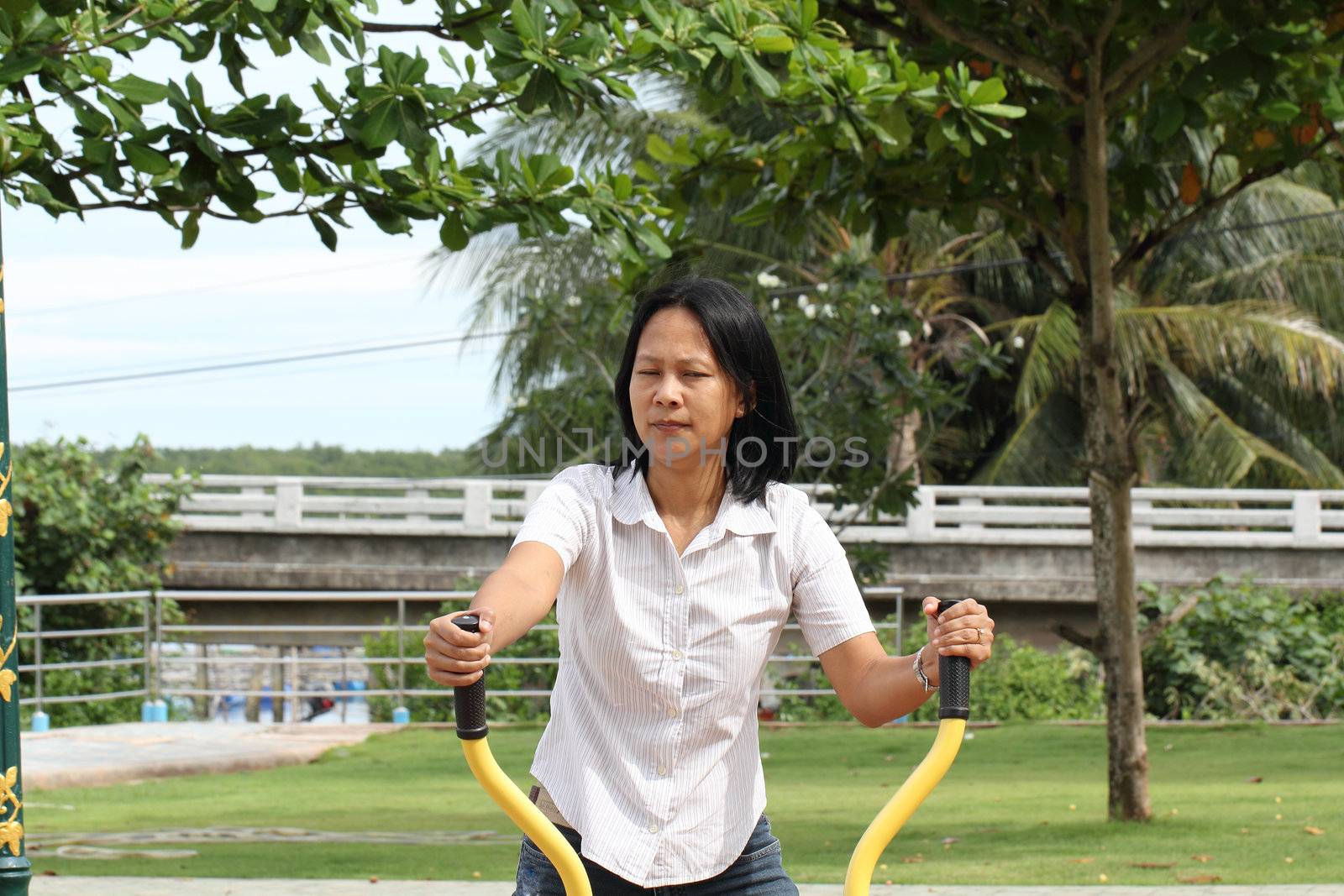 Woman exercising outdoor in a park