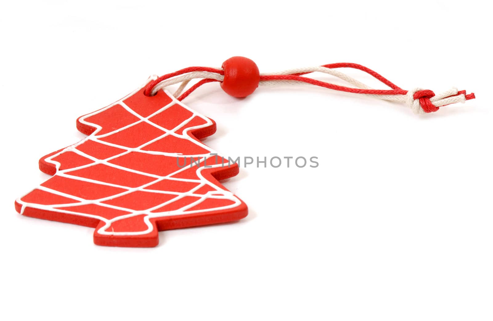 Christmas ornament of a red spruce wood in white background