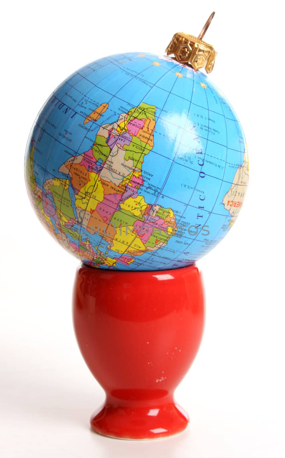 Globeas a Christmas ball  in an egg cup