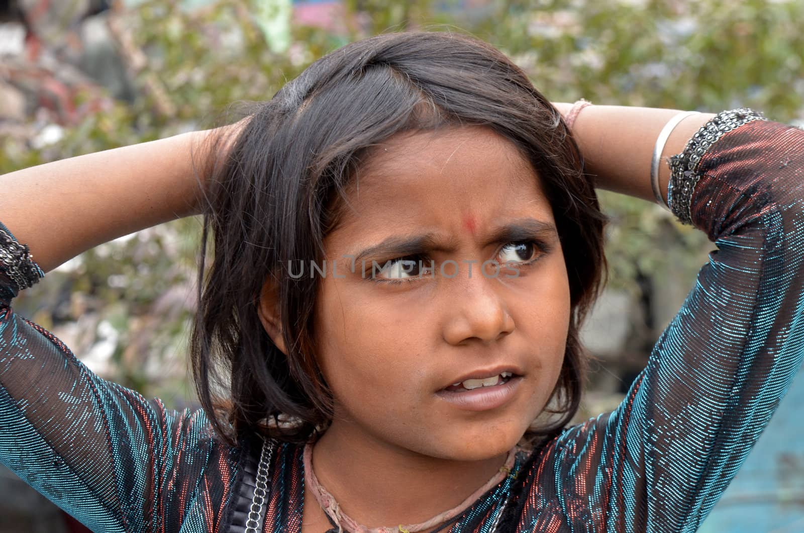 New Delhi,India-February 4, 2013:An unidentified child lives in the slums of New Delhi. 50% of the population of New Delhi is thought to live in slums,on February 4,2013 in New Delhi