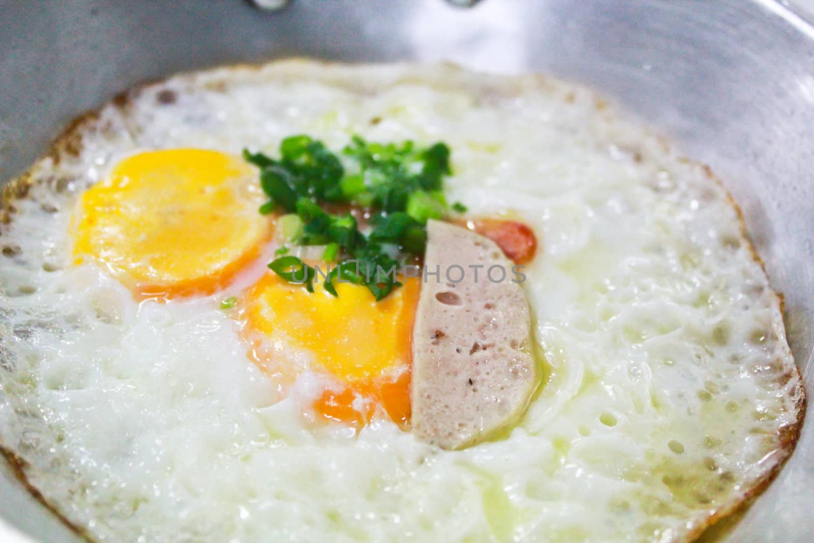 fried egg stuff with hot pan was served in the morning