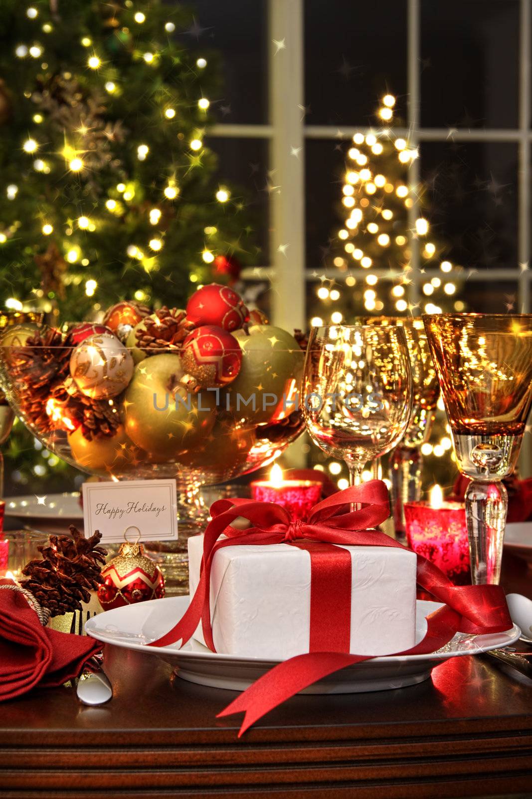 Festive table setting with red ribbon gift by Sandralise