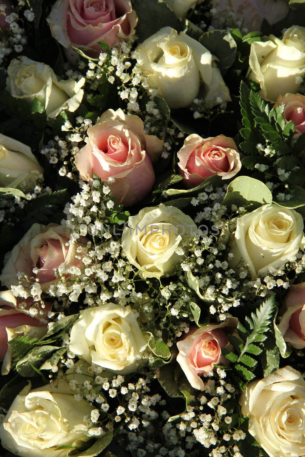 Wedding flowers in pink and white roses and gypsophila