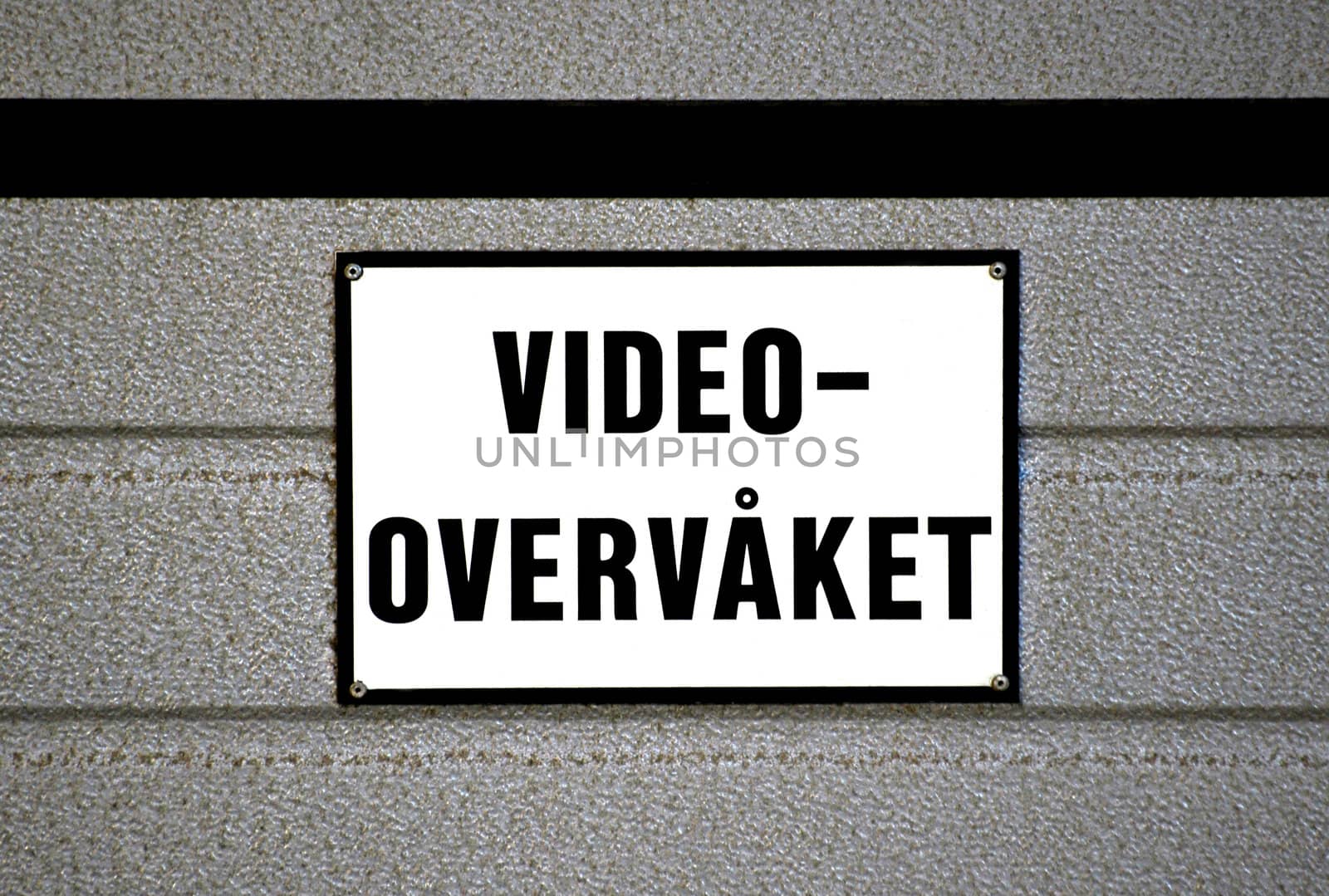 Norwegian sign.
Text on sing in Norwegian: Video overvåket