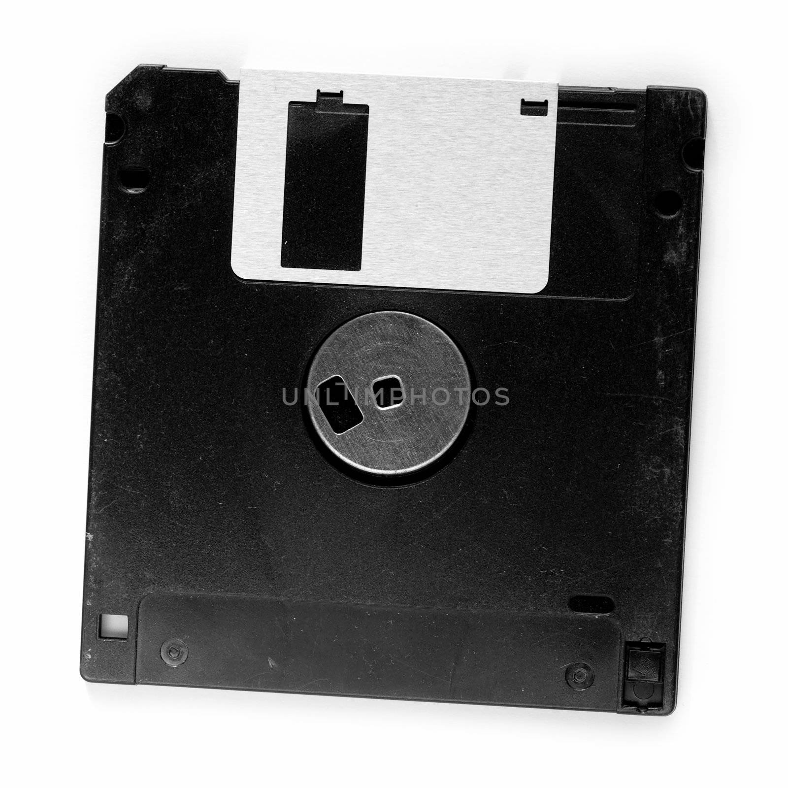 Ancient Technology. Black  floppy disc on a white background
