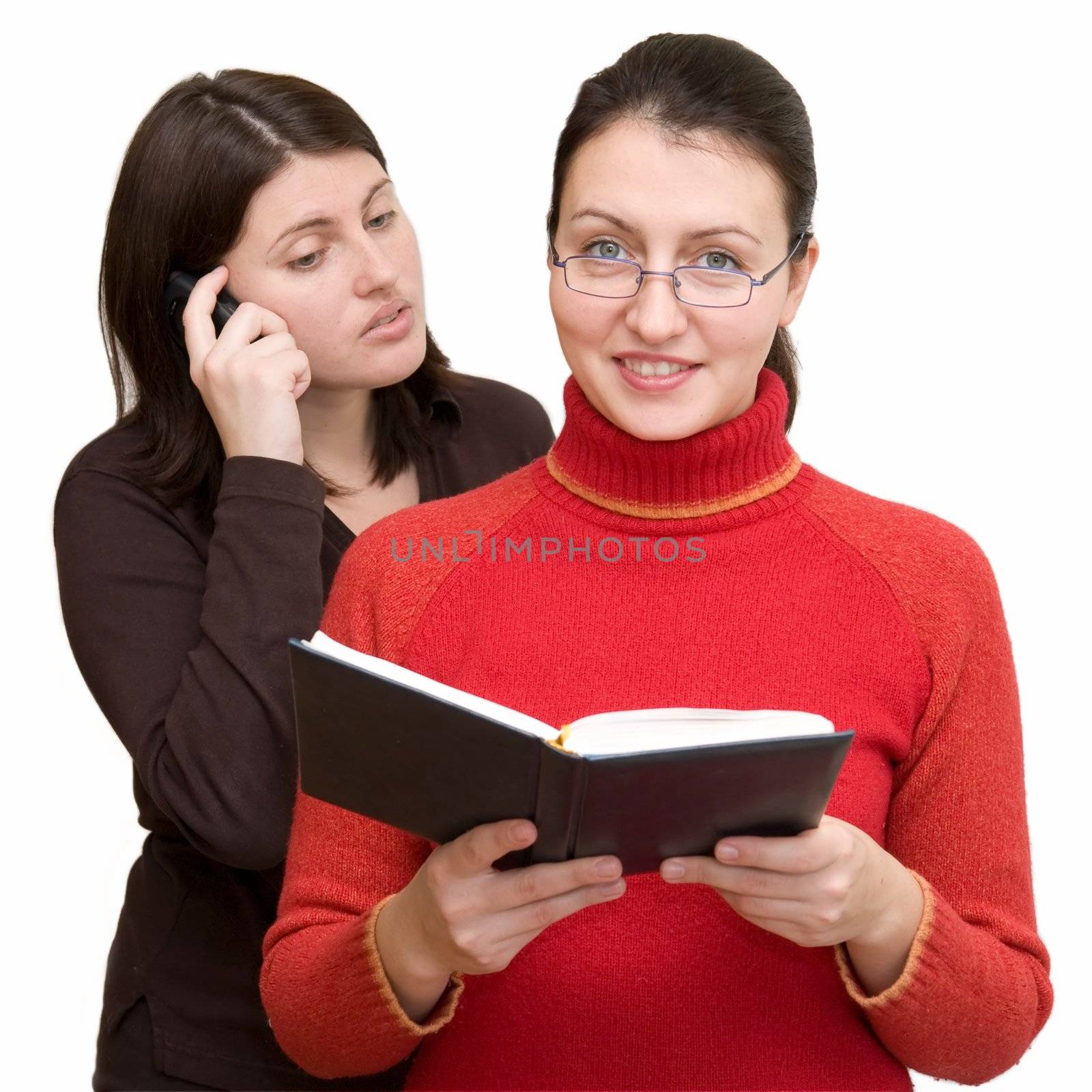 Intensive training. Two beautiful young women on a white background.