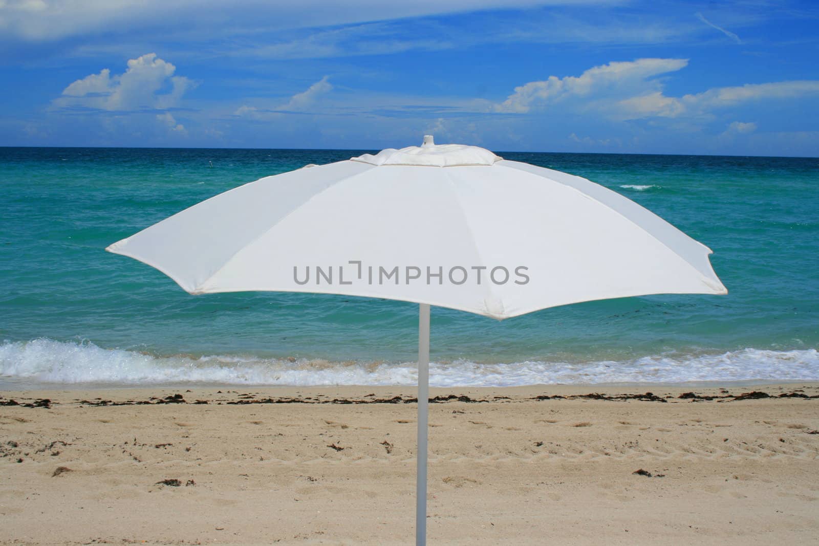 Close up of a beach umbrella on a sunny day.
