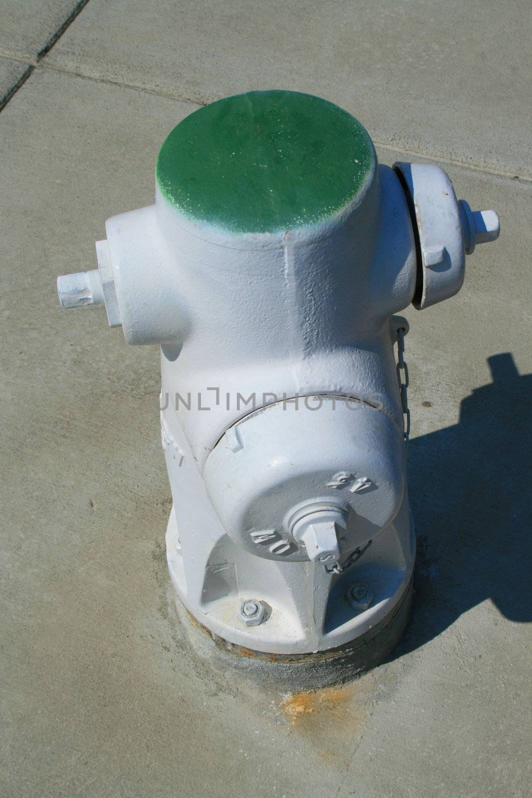 Close up of a fire hydrant on a street.
