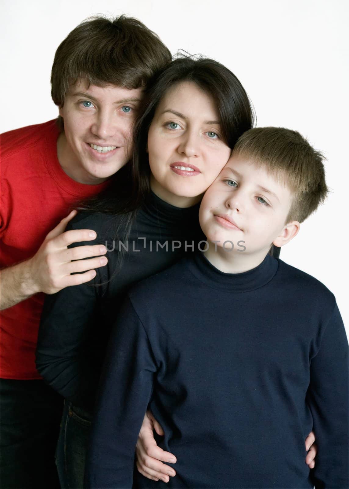Smiling family on a white background.