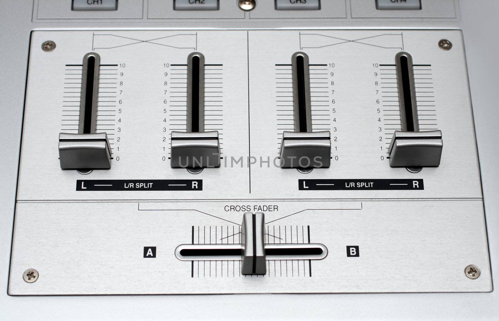 fading controls of dj music mixer close-up