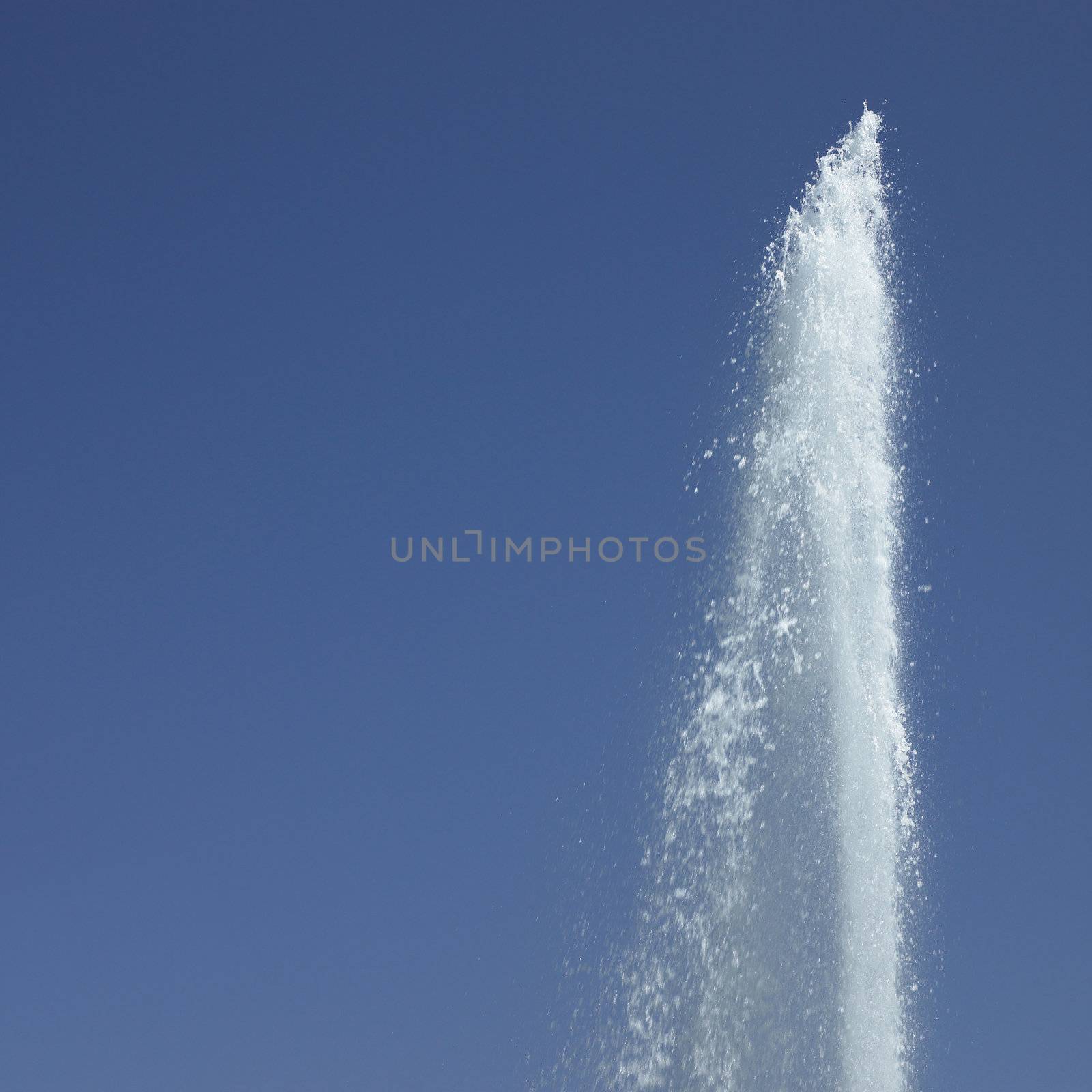 Fountain in the blue sky