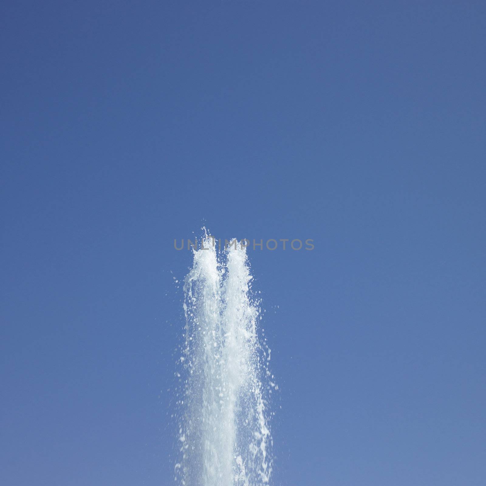 Fountain in the blue sky