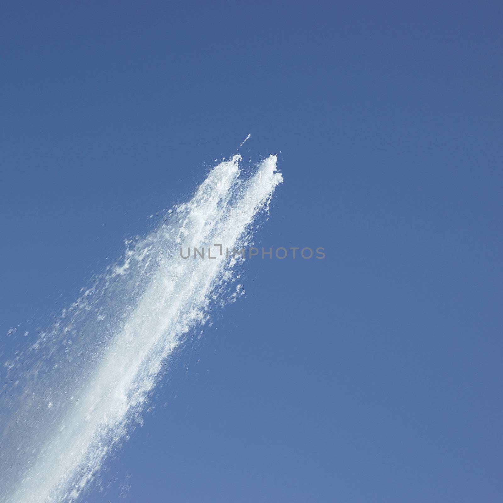 Fountain in the blue sky