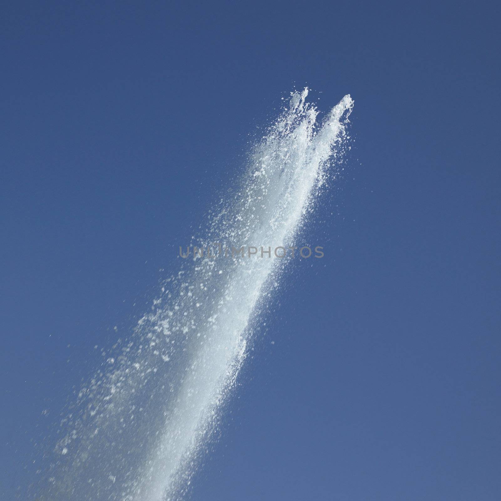 Fountain in the blue sky