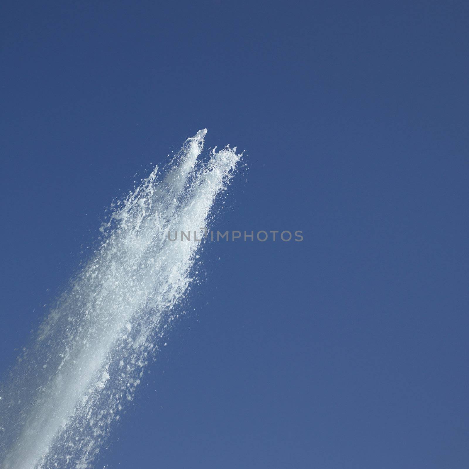 Fountain in the blue sky