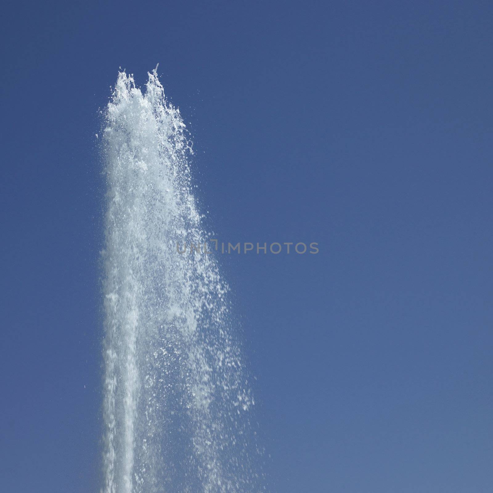 Fountain in the blue sky