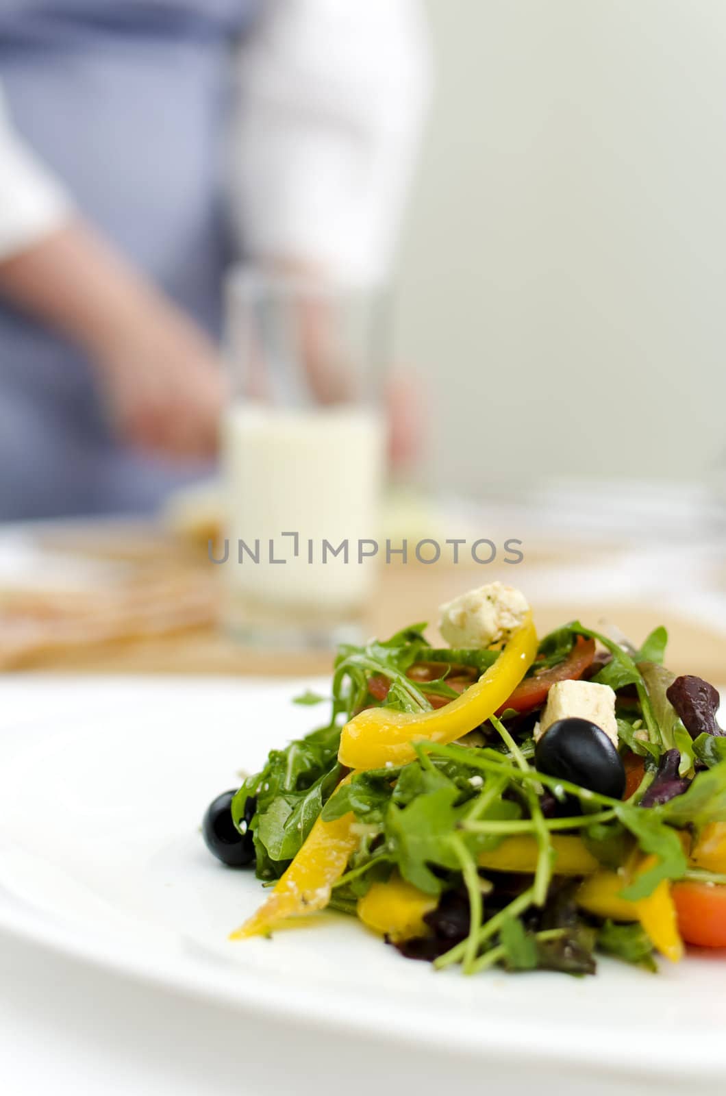 fresh Greek salad on white plate, cook on background