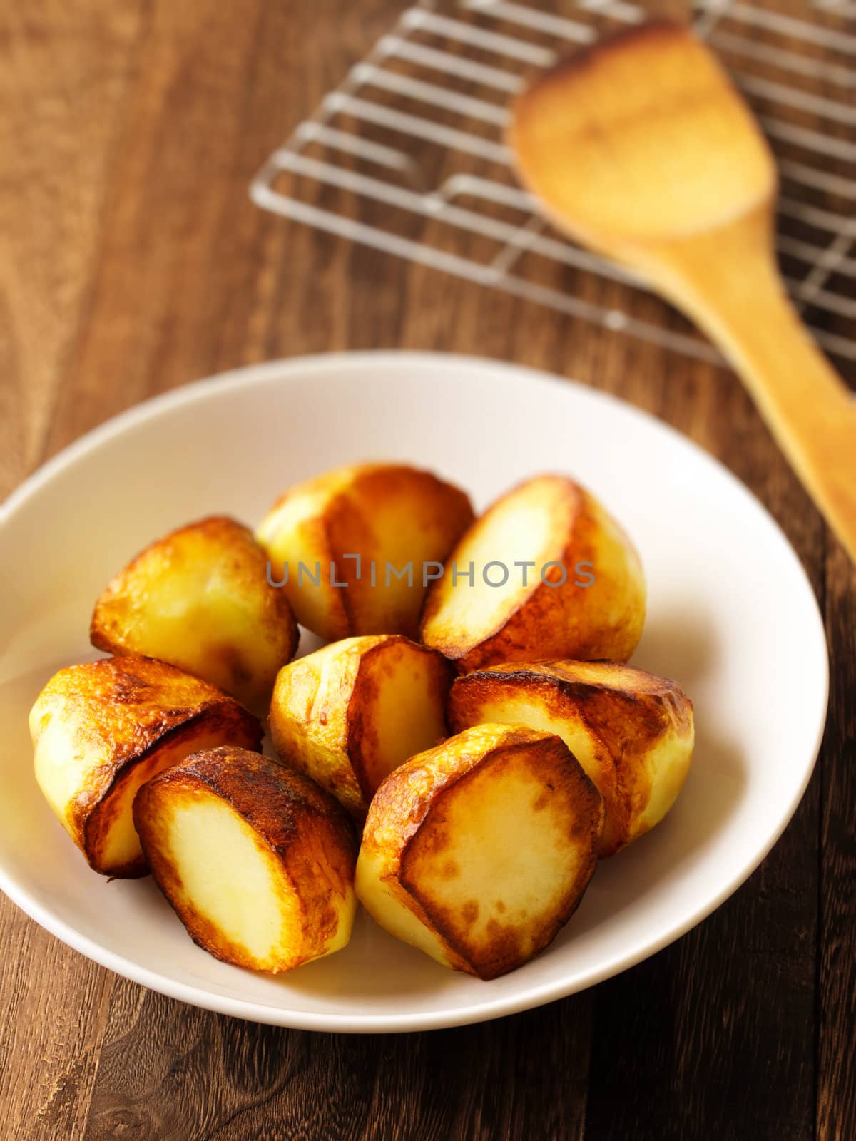 close up of a bowl of roasted potatoes