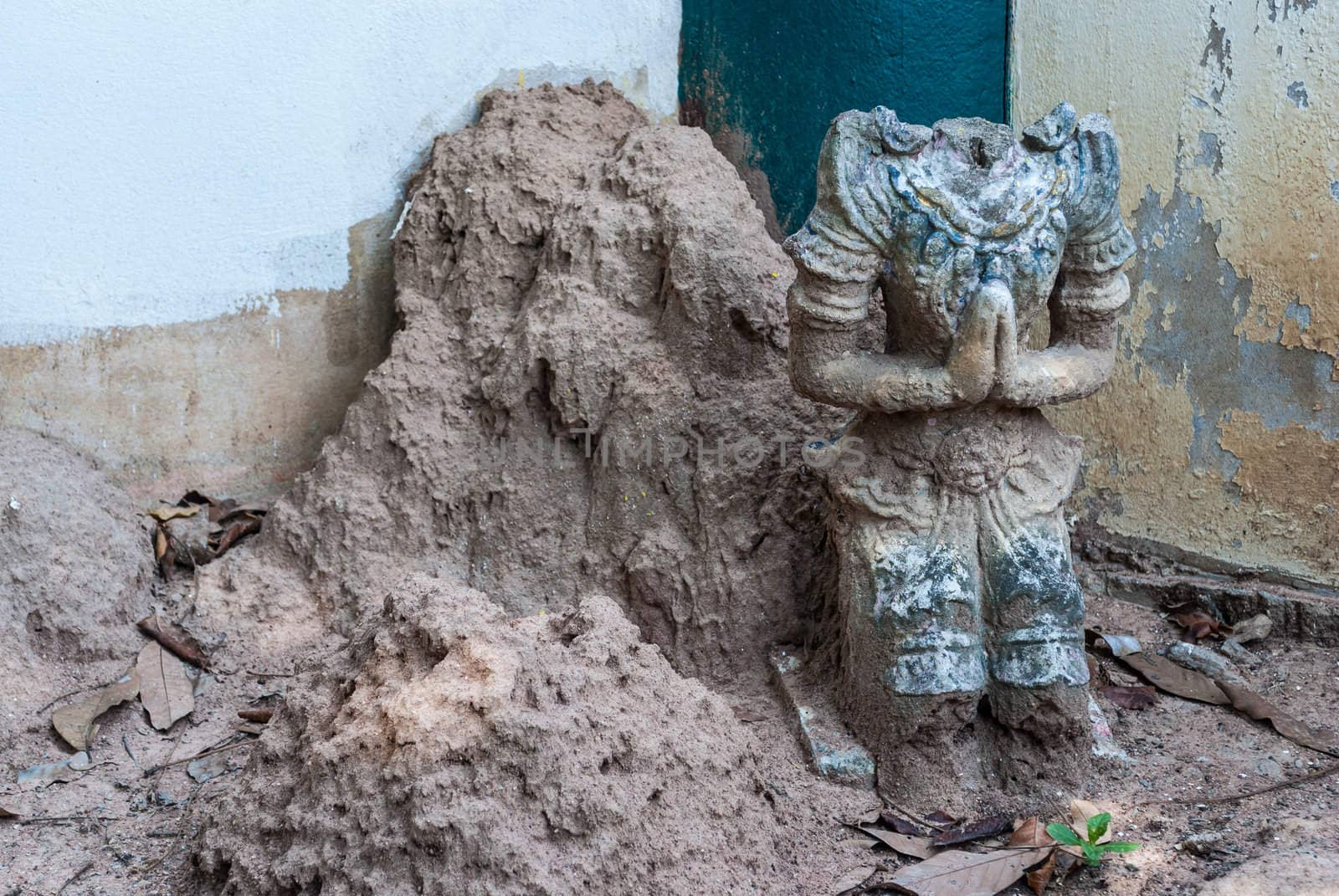 Abandoned headless male deity who protects religious at Paa Jareon Tham temple, Chiangmai, Thailand