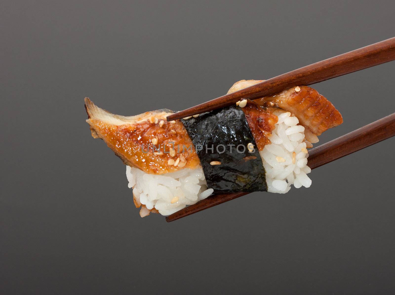 Sushi with chopsticks by Discovod
