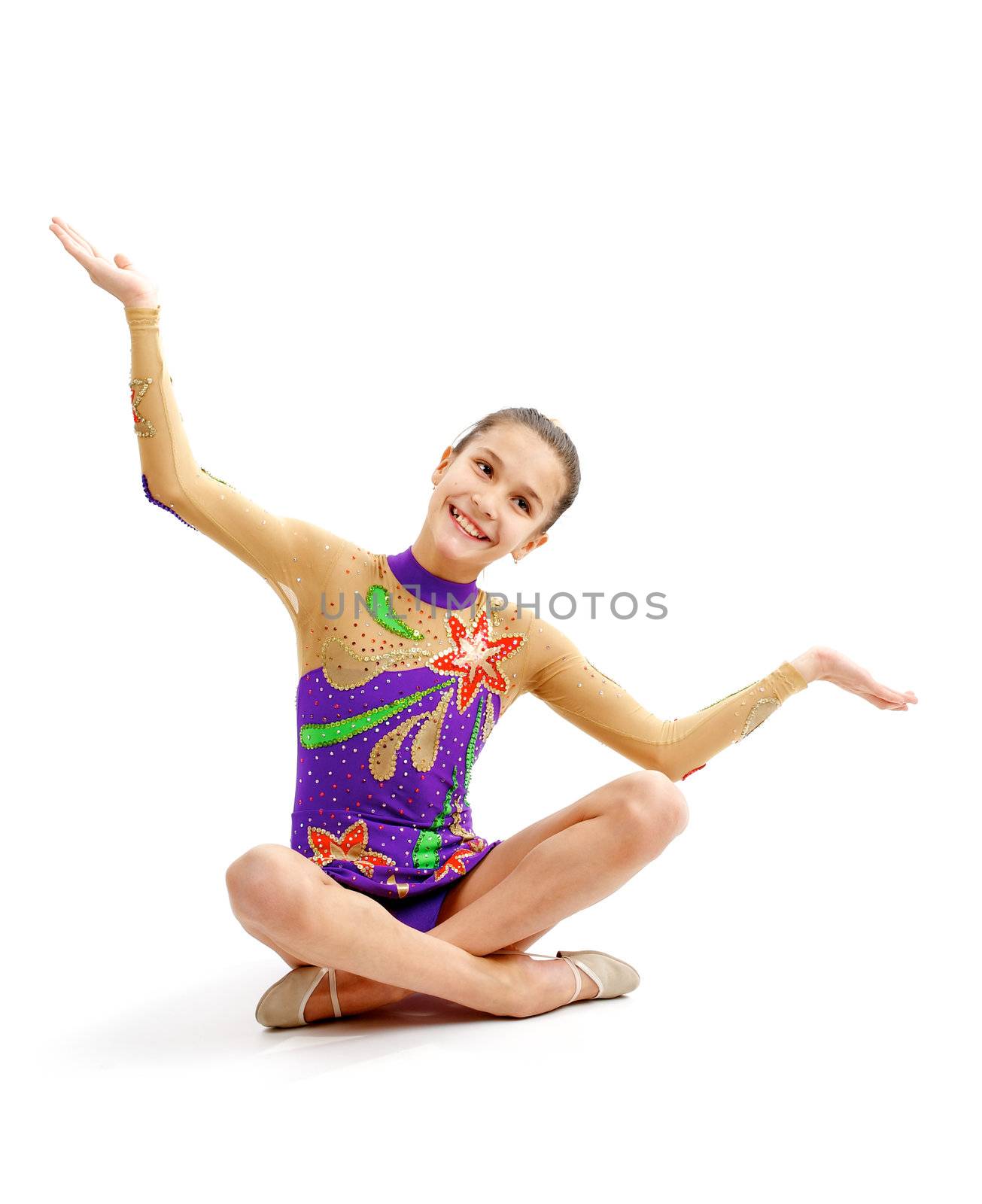 Young Girl Gymnast Sitting in Lotus Pose isolated on white background