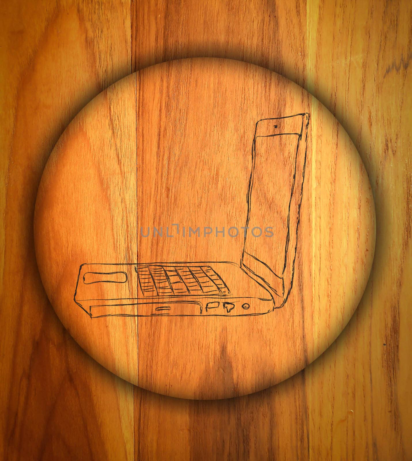 laptop symbol  on   wood background.  by rufous
