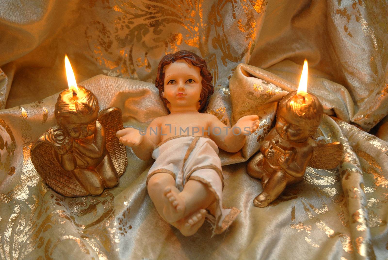 Christmas card, baby Jesus and two lighted candles by Carche