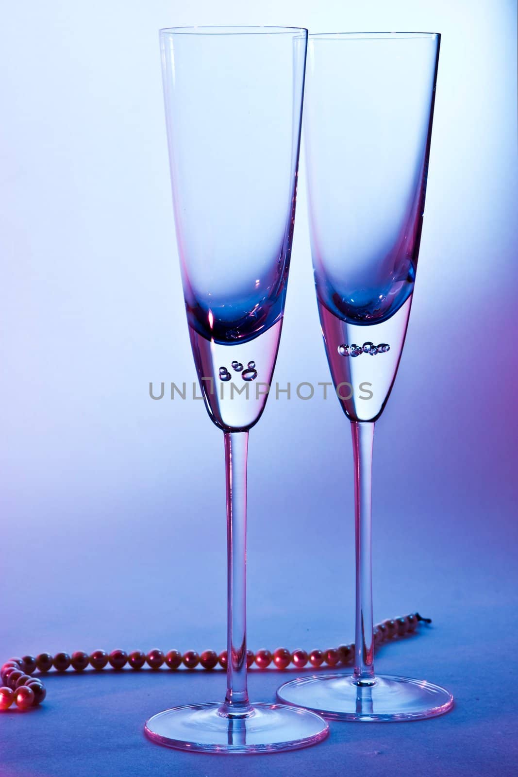 glass for champagne  on blue and red background