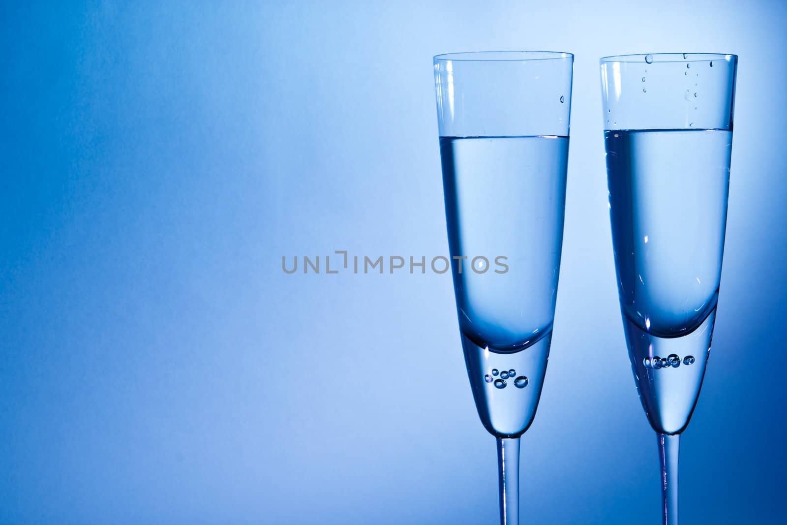 glass for champagne  on blue and red background