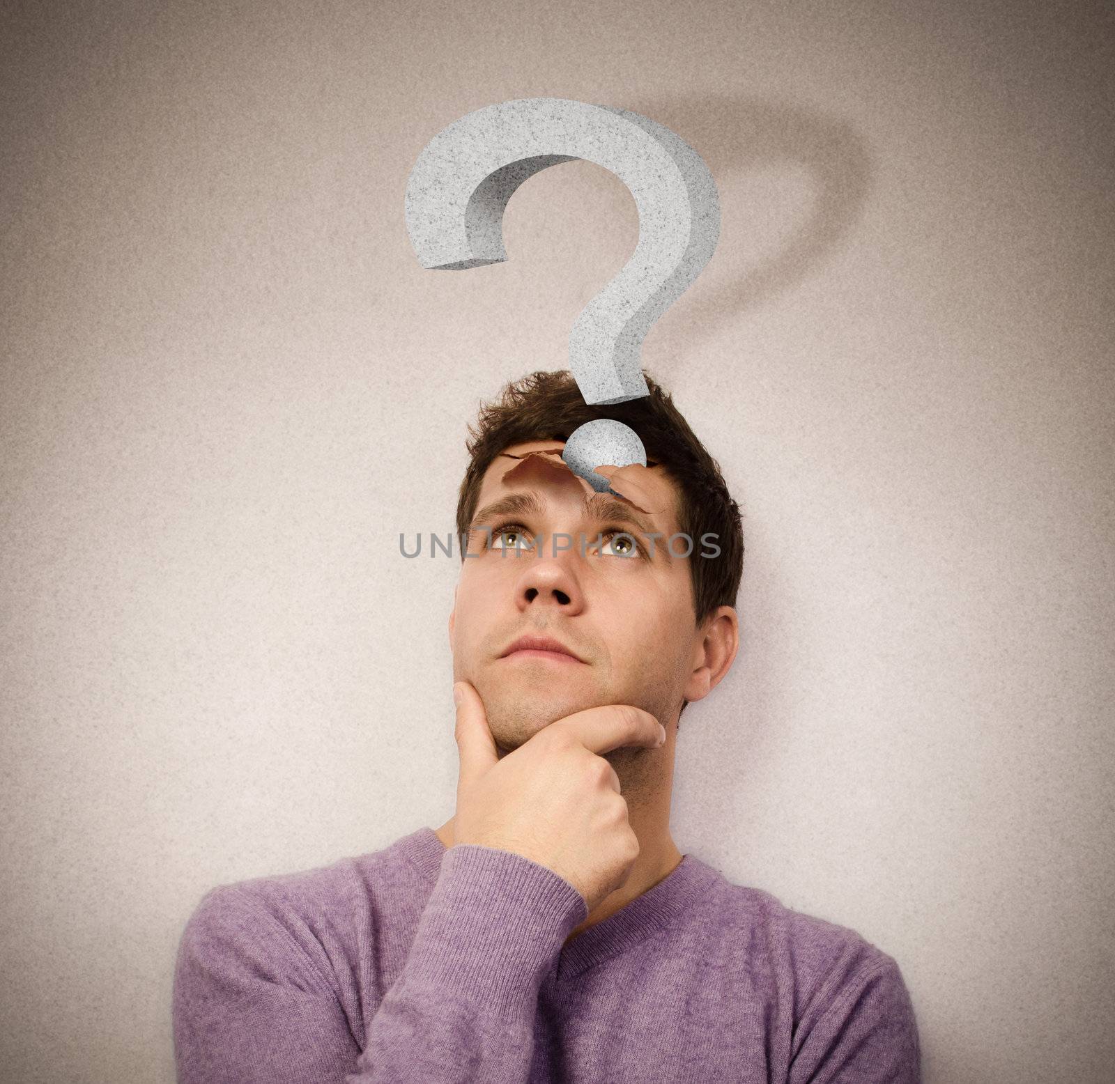 Young man lost in thought with a question mark leaving the head