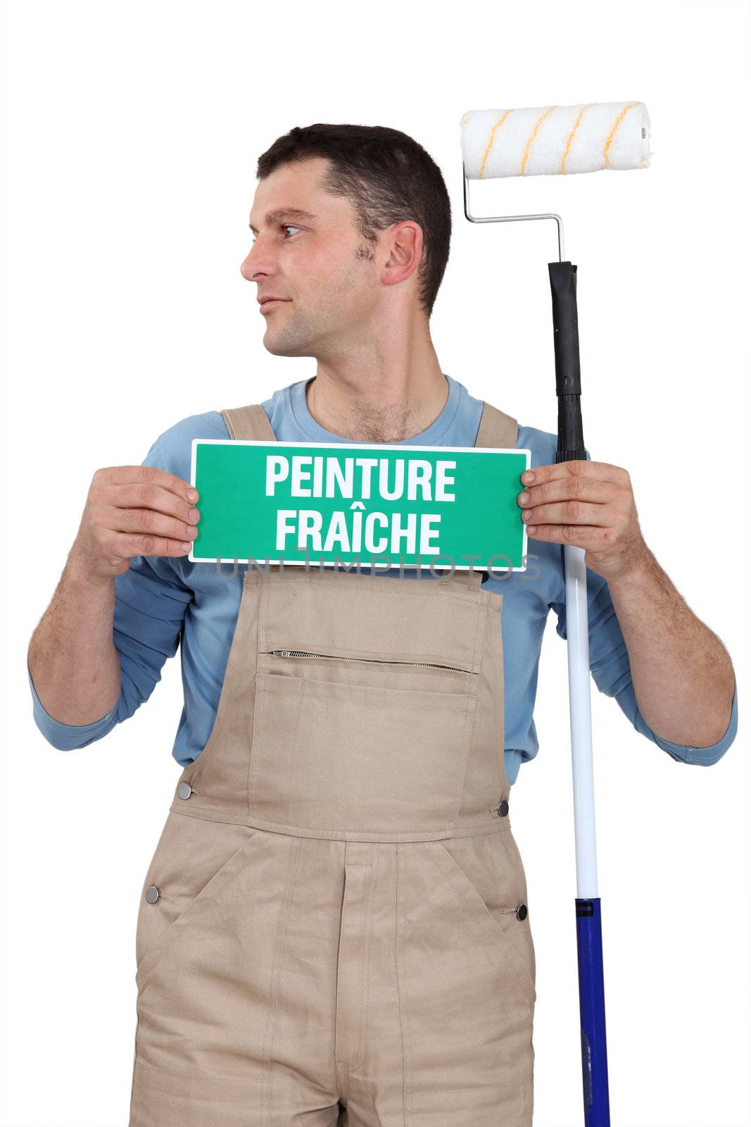 Man with a French wet paint sign by phovoir