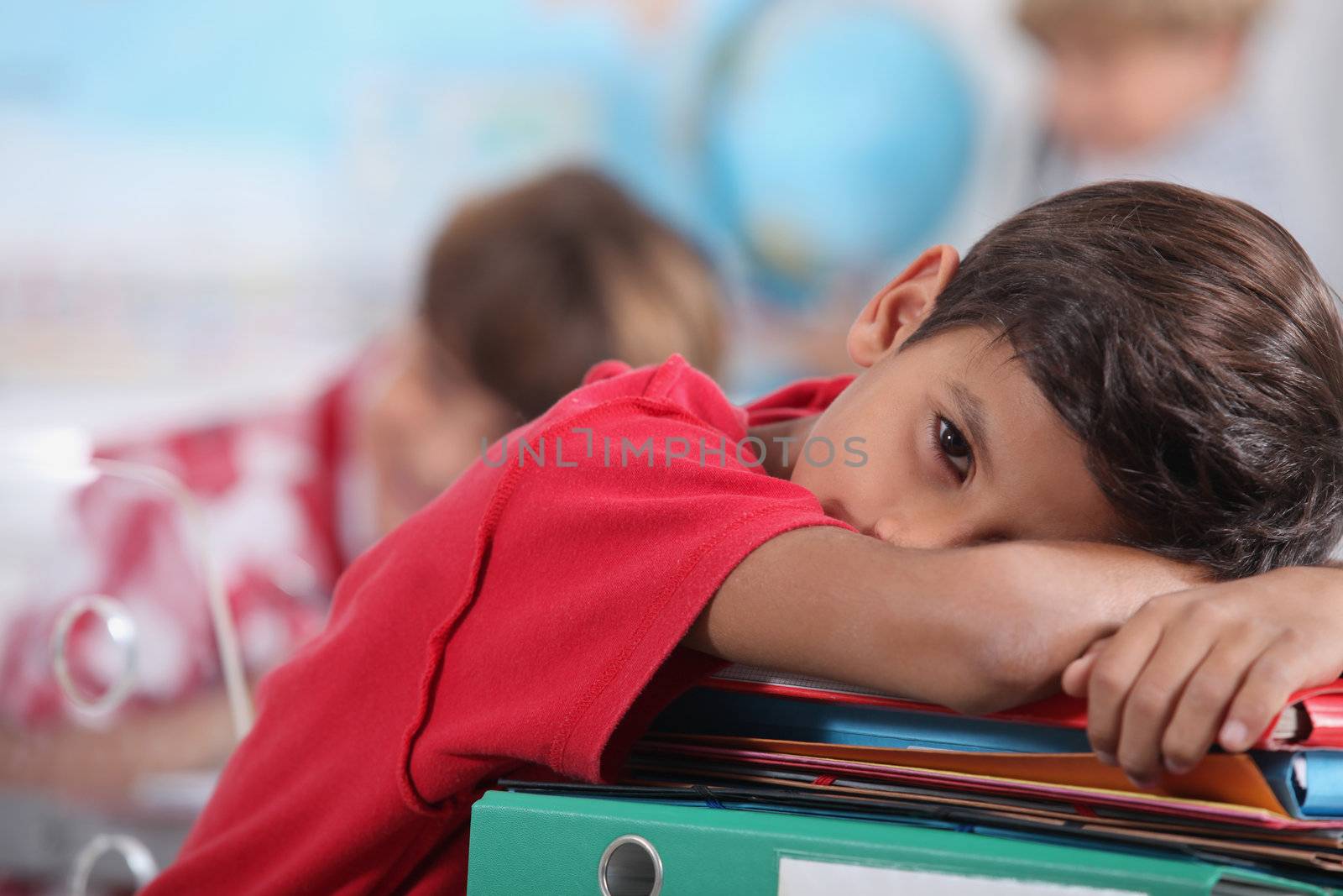 sleepy boy in classroom by phovoir