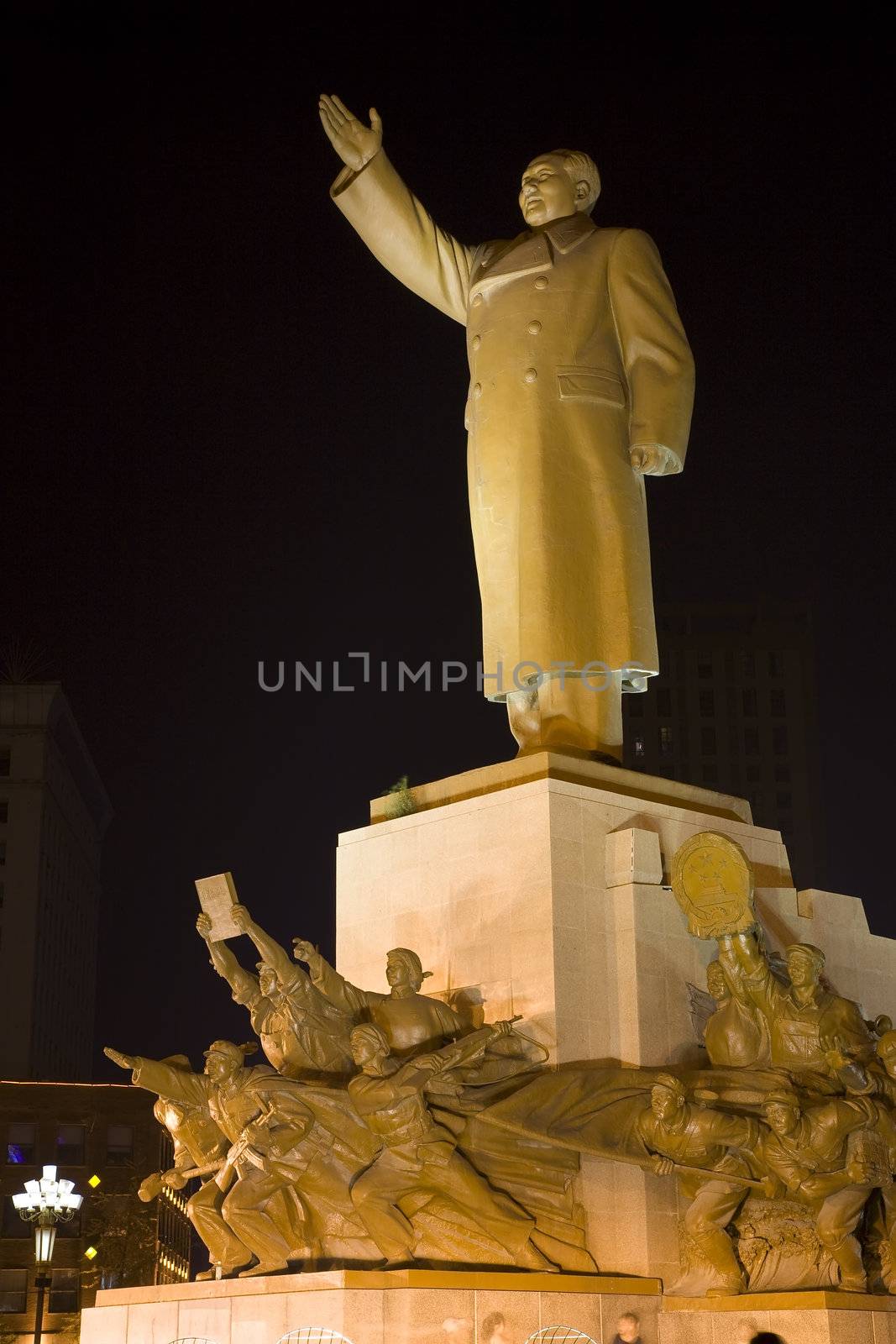 Mao Statue Heroes, Zhongshan Square, Shenyang, Liaoning Province, China at Night Lights Famous Statue built in 1969 in middle of Cultural Revolution.