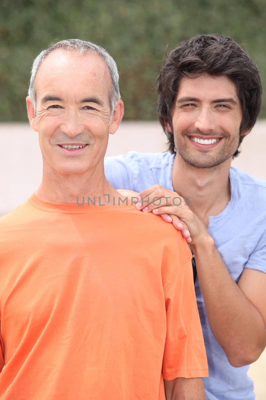 Portrait of two men outdoors